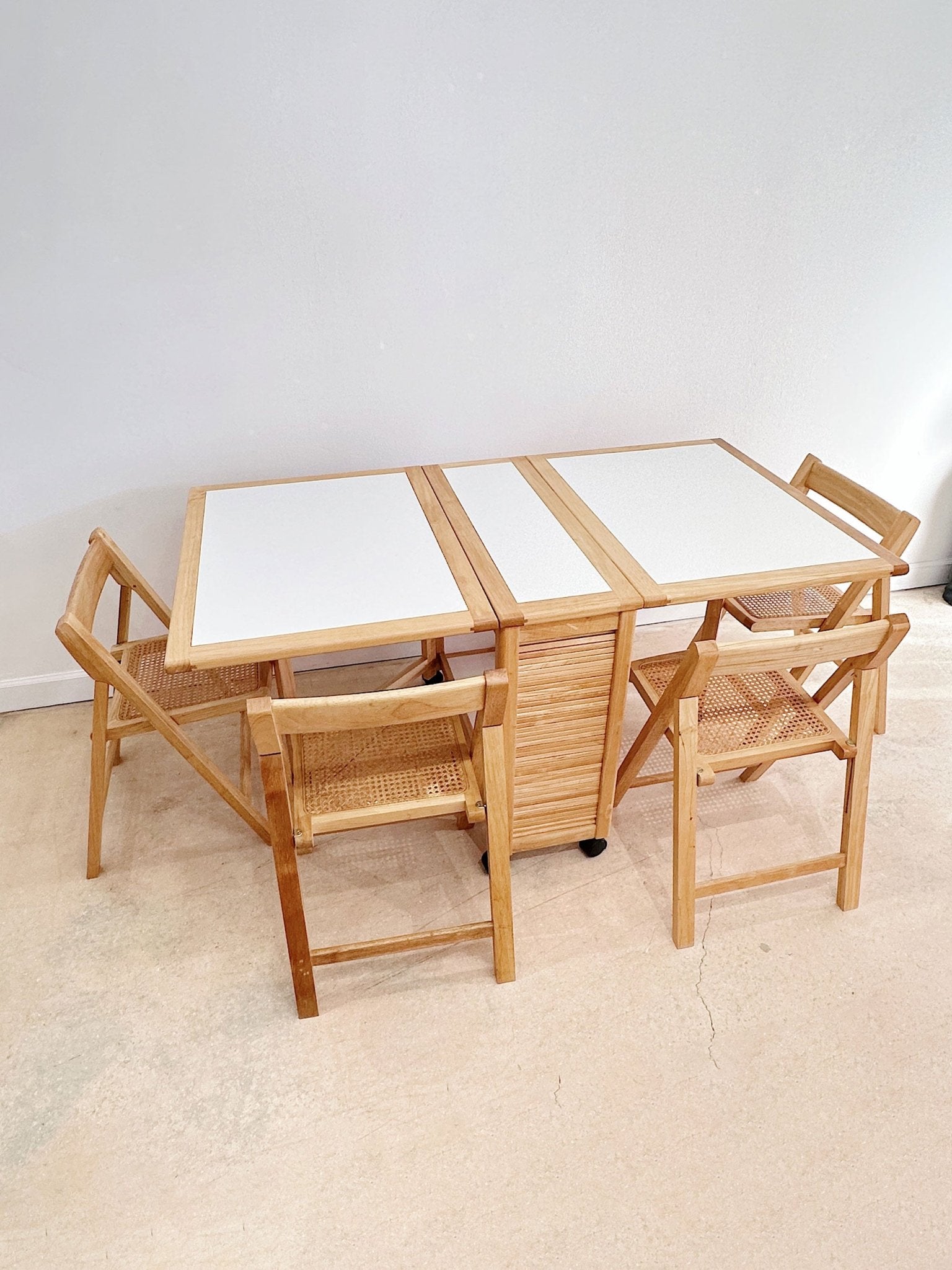 Drop leaf table with hideaway online chairs