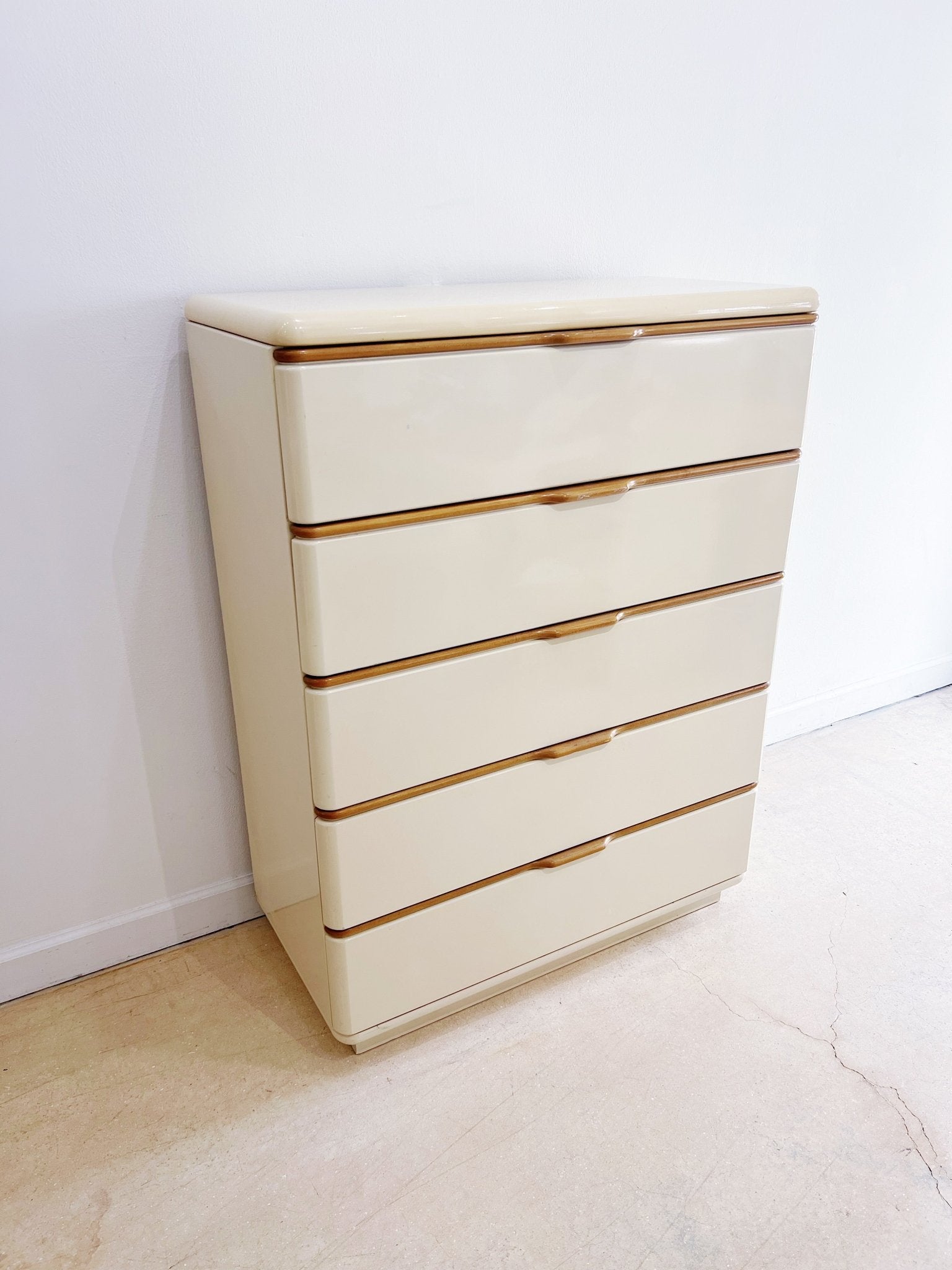 cream lacquer dresser CREAM LACQUERED DRESSER WITH BRASS ACCENTS